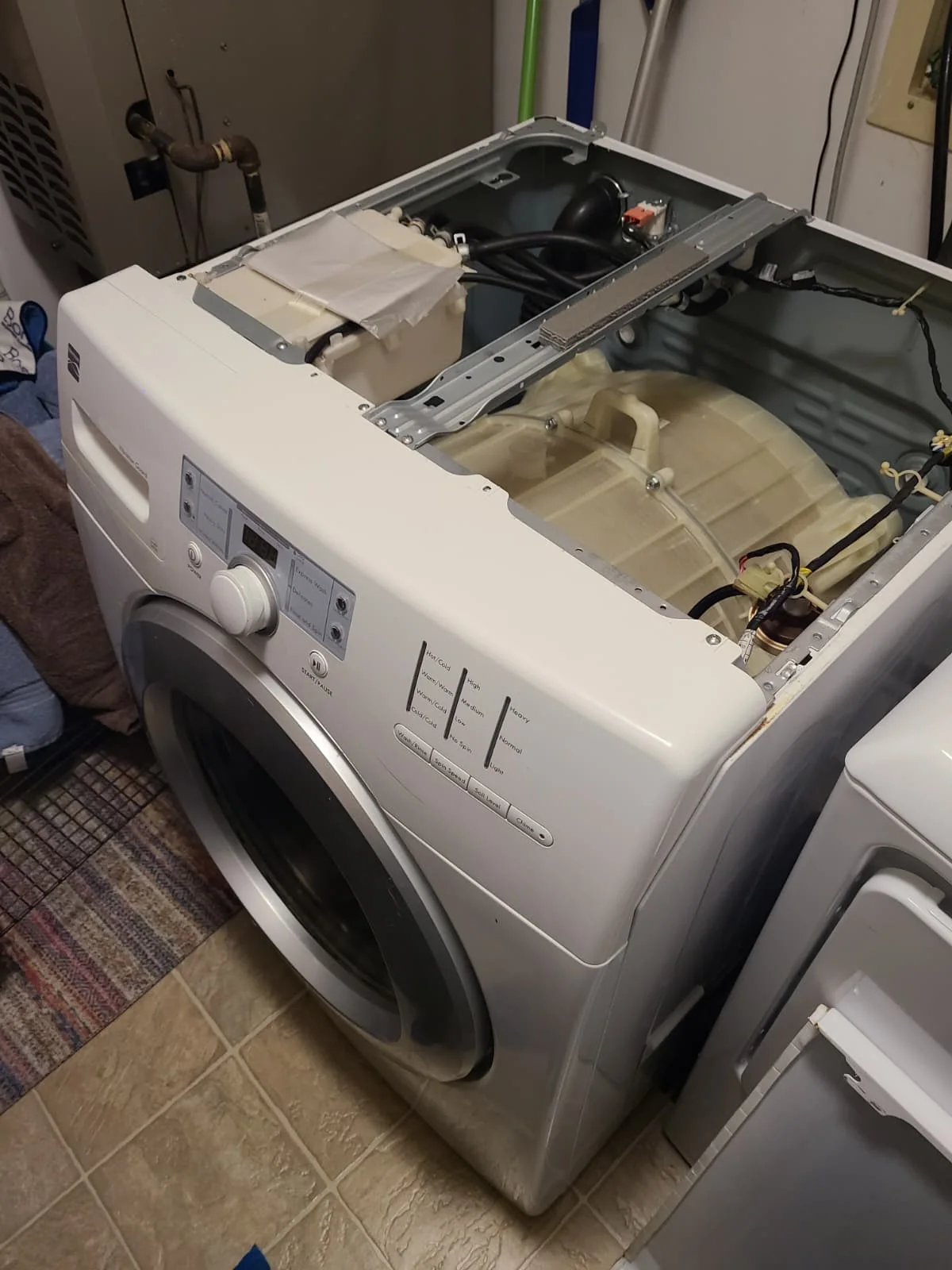 Kenmore washer opened for dispenser repair in Fishers